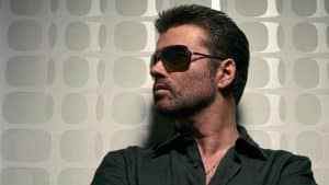 George Michael wearing dark sun glasses
