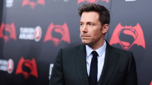 Ben Affleck wearing a suit and tie at a movie premier