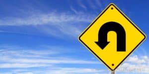 a u-turn road sign
