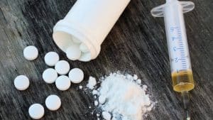 Synthetic Fentanyl - A Form of Opioids Drugs on Wooden Table