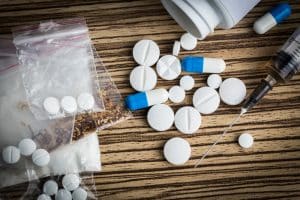 Pills spilling out of bottle