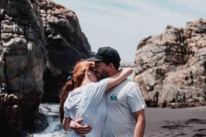 a woman is giving support and encouragement her loved one in his early recovery period.