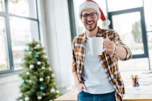 a man enjoys celebrating Christmas and New Year without alcohol drinking.