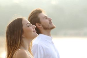 a woman and a man are ending their year-end with practising self-reflection and self awareness