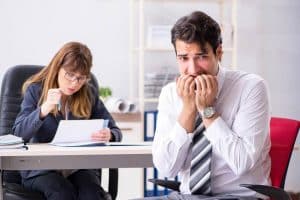a man is afraid of telling his mental health problem to his boss.