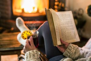 Diving into a book on mental health can help you find some support during holidays alone.