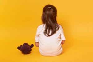 little girl sitting backwards reflex childhood sexual abuse