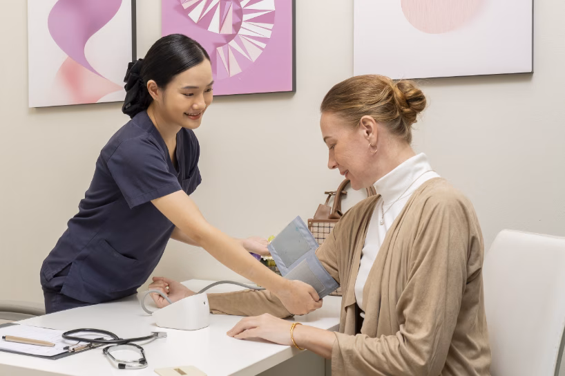nurse female client blood pressure